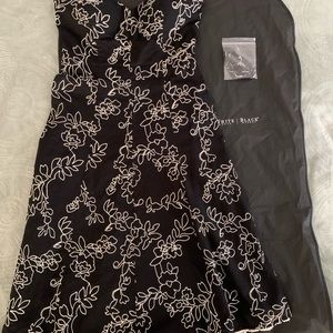 WhiteHouse-BlackMarket: Black Strapless Dress; Cream embroidered floral design.